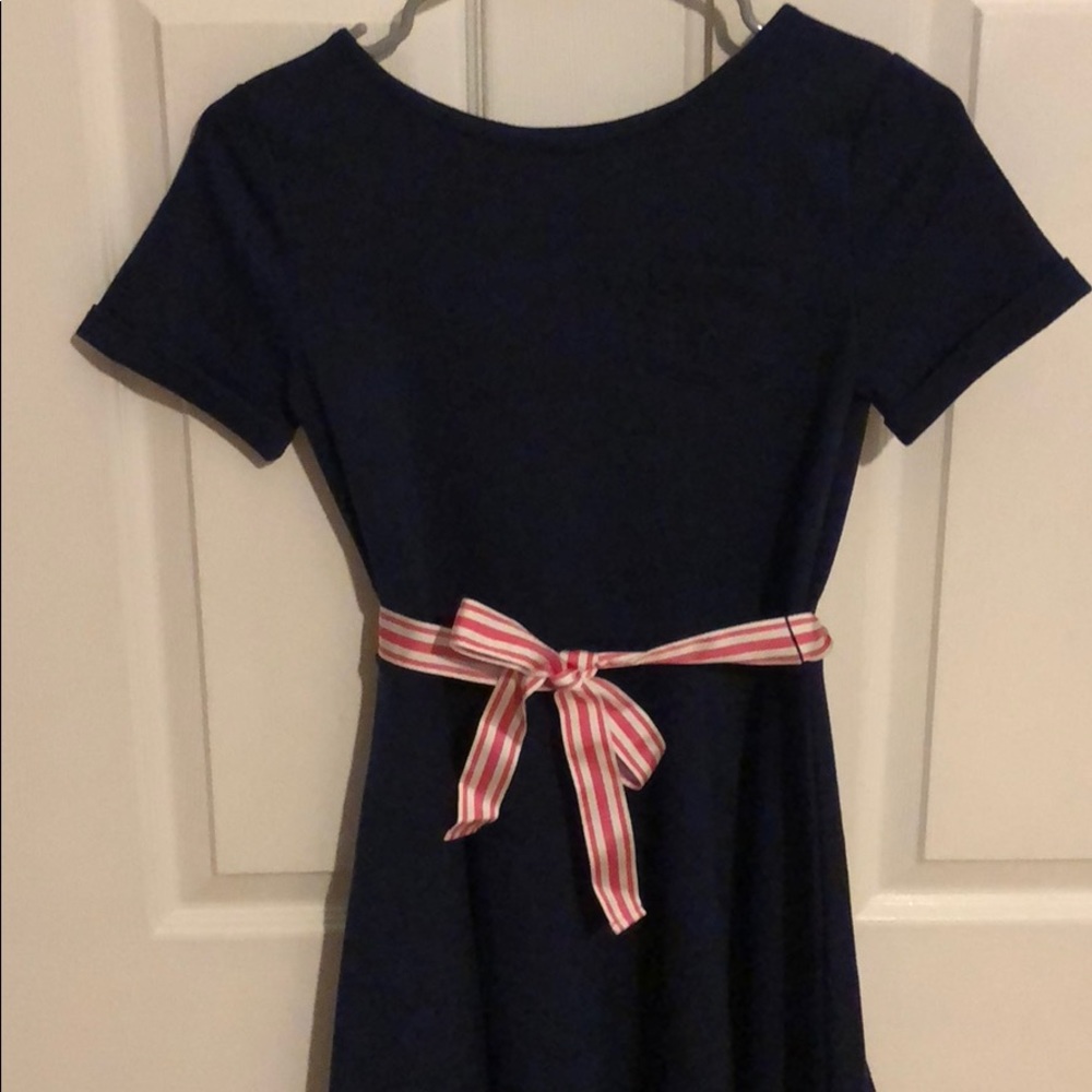 Navy blue girls dress with pink and white bow belt
